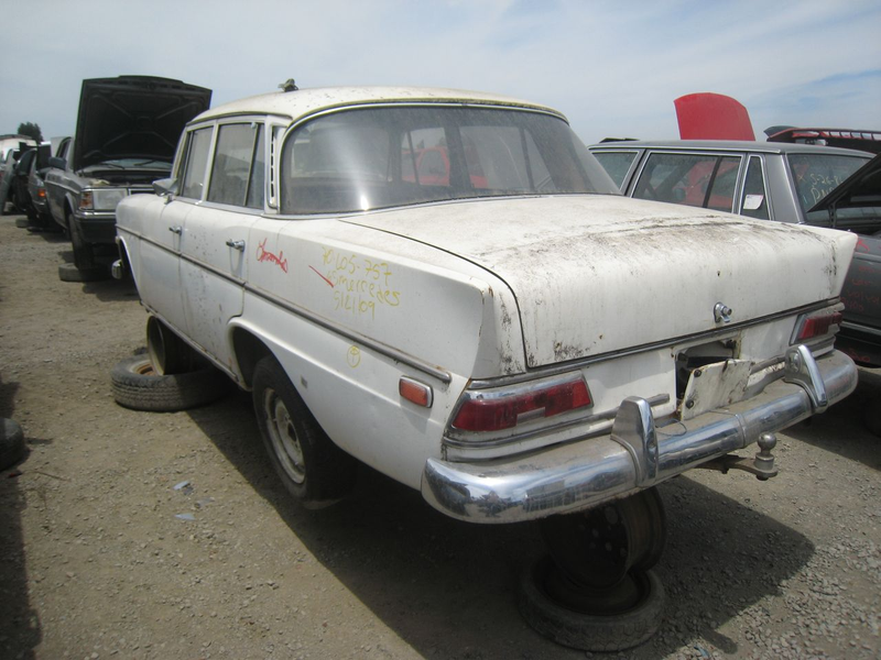 Illustration for article titled Happy Tailfins And All, This 1965 Mercedes-Benz 190c Is Crusher-Bound